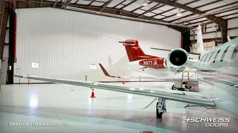 Schweiss hydraulic hangar door with inside lined