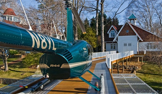 Helicopter Taxis into Aviation Hangar Doors