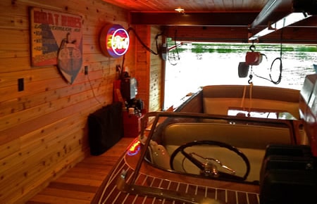 Electric hoists lift boat out of water in winter