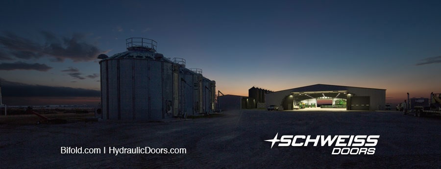 Well-lit farm building with One-Piece Schweiss Door