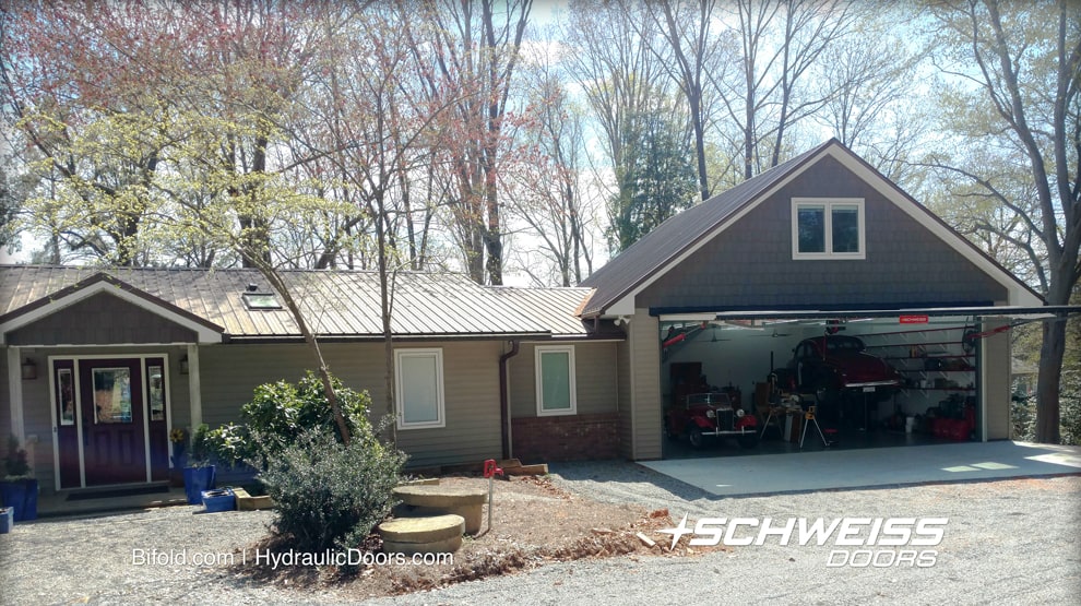 Door gives shade when open and its pump is conveniently above the garage